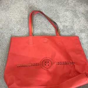 Red faux leather bag